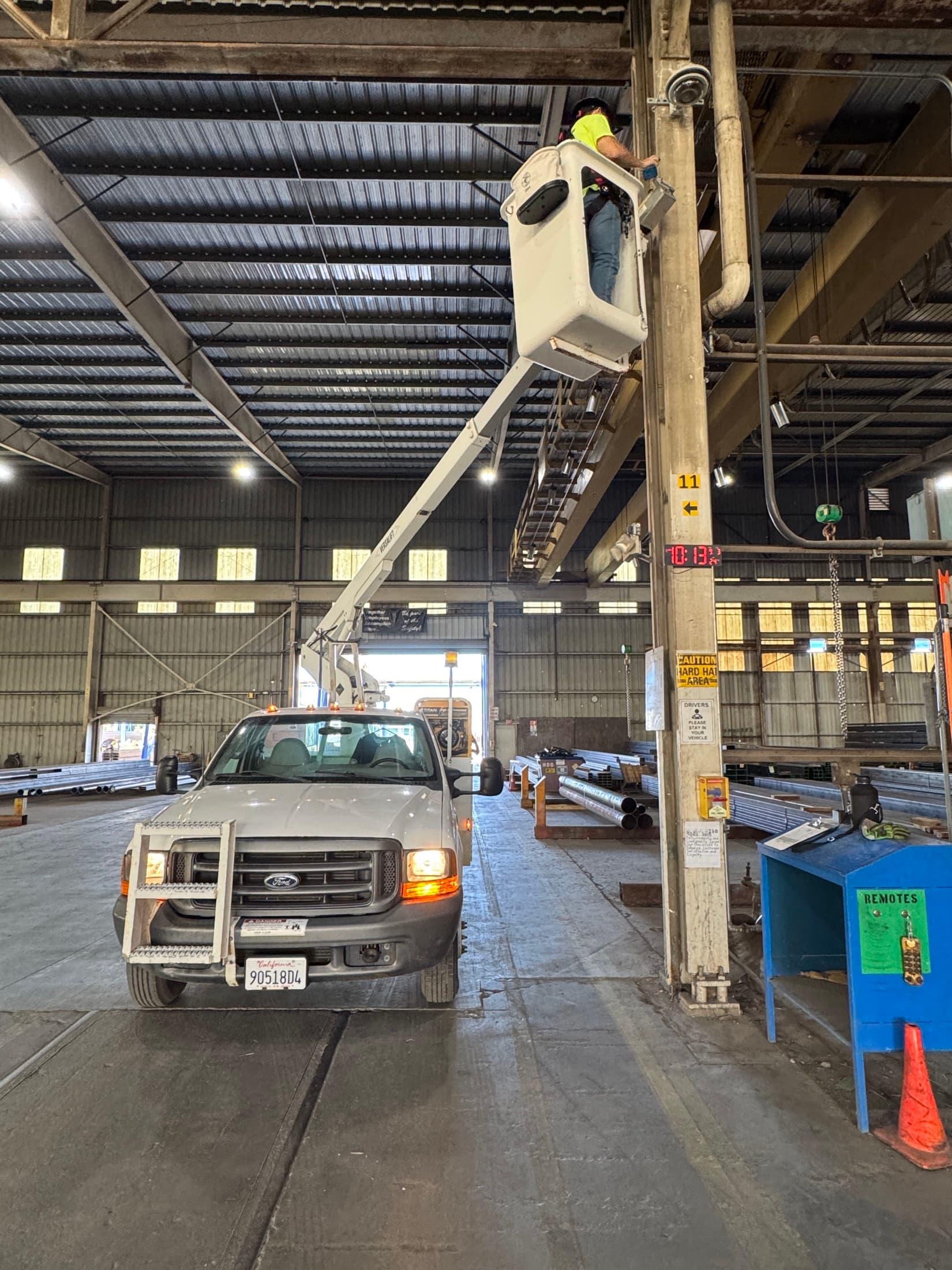 Commercial yard storage containers arranged for exterior camera coverage planning
